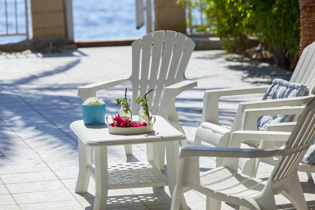 Meneou Beachfront Villa Sunset Перволия Номер фото