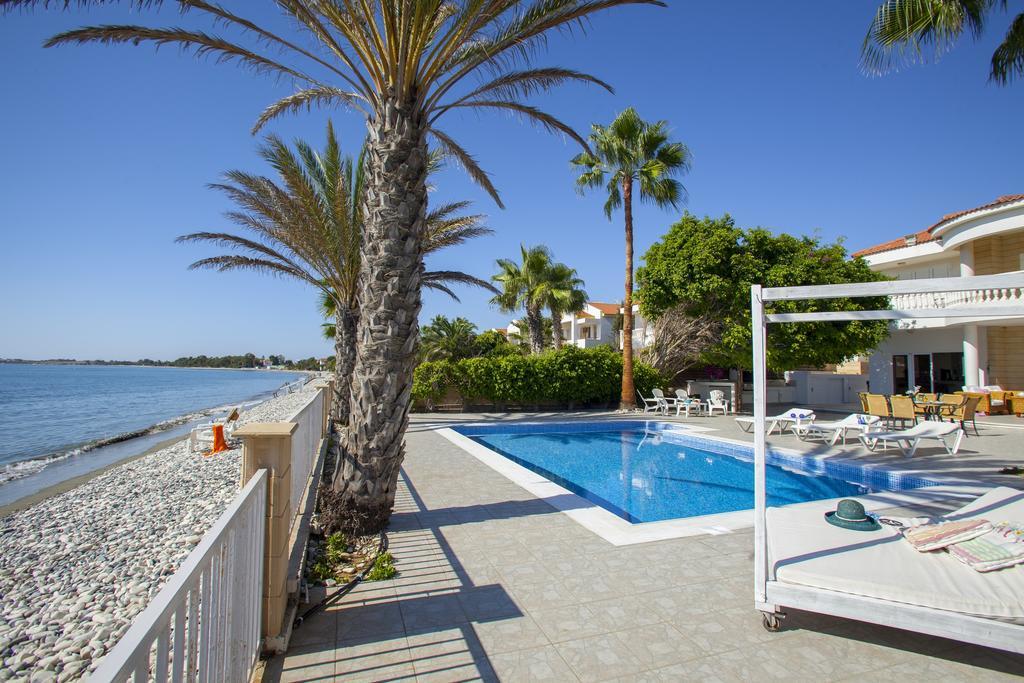 Meneou Beachfront Villa Sunset Перволия Номер фото